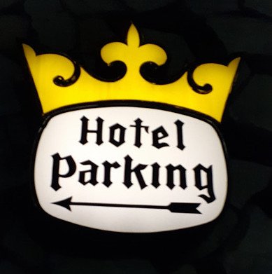 Glowing Hotel Parking sign