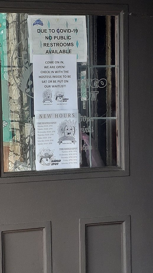 Kings Inn San Diego restaurant Covid policies posted on the door