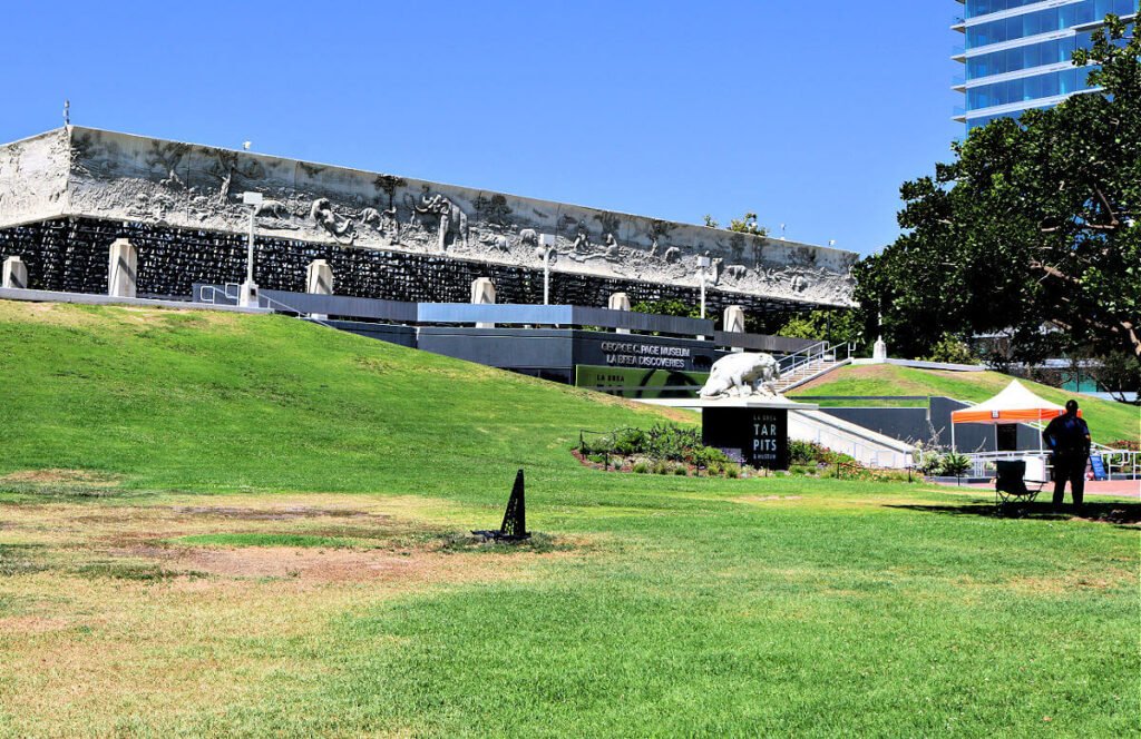 An exterior photo of the George C. Page Museum at the La Brea Tar Pits in Los Angeles.
